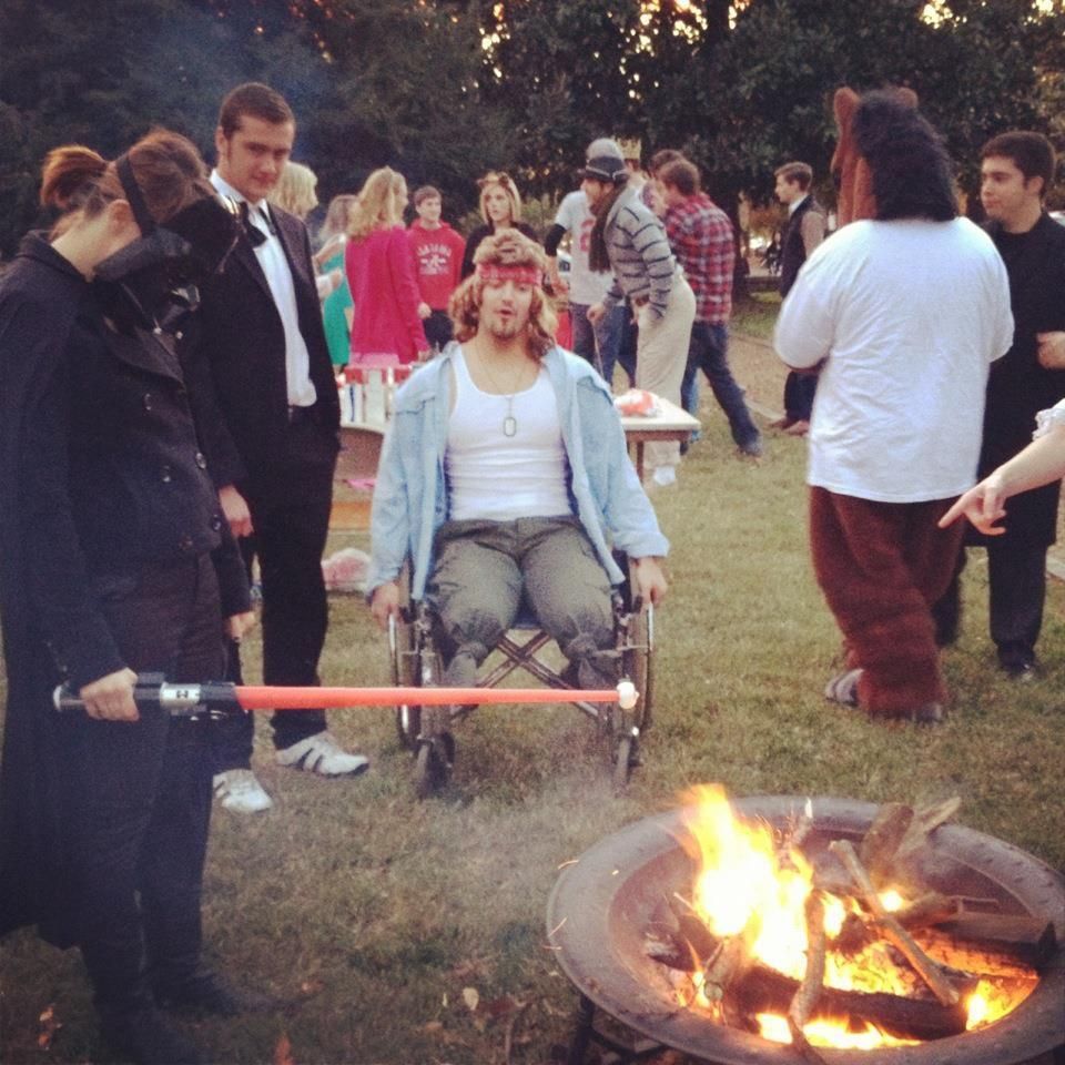Sad Vader roasts a marshmallow.