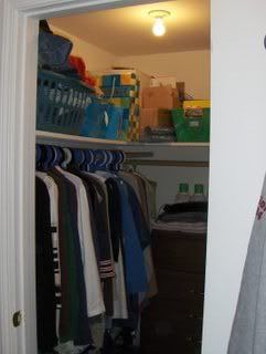 Shelving above the clothing is excellent storage space